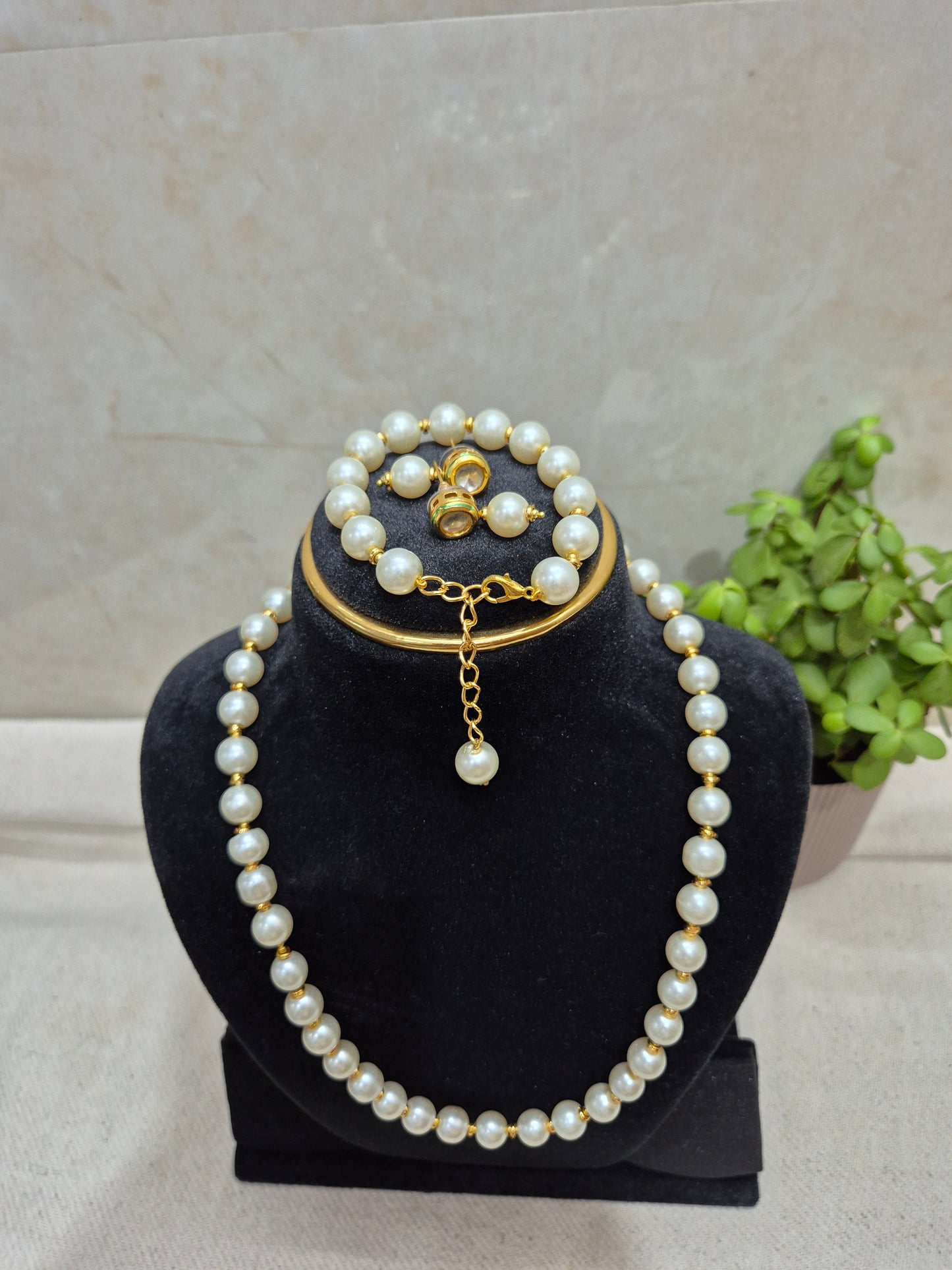 White pearl jewellery set with golden spacers - 5 piece set