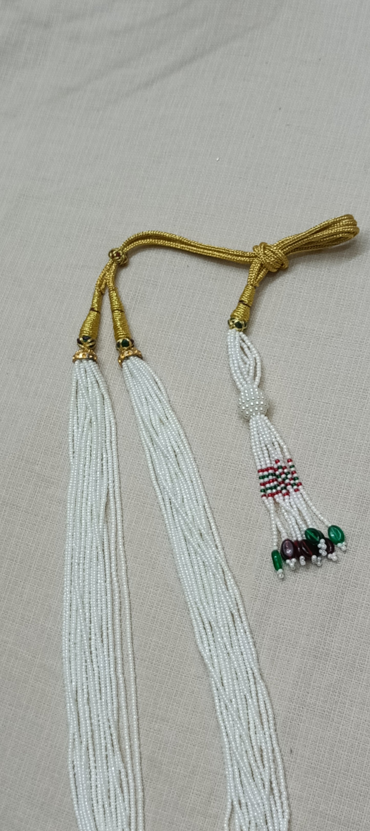 Graceful Multi-Strand White Bead Necklace with Colorful Tassel