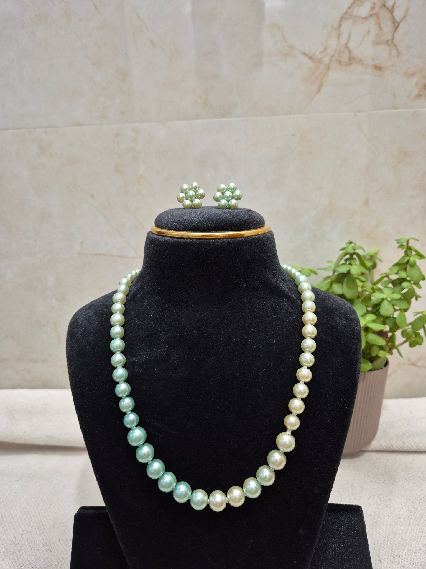 Metallic green and beige dual shade elegant pearl necklace set