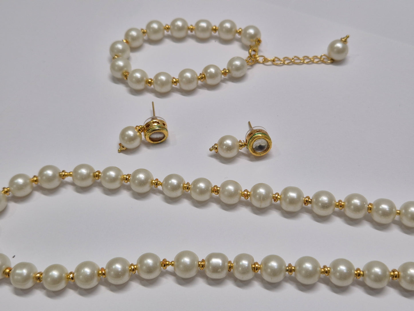 White pearl jewellery set with golden spacers - 5 piece set