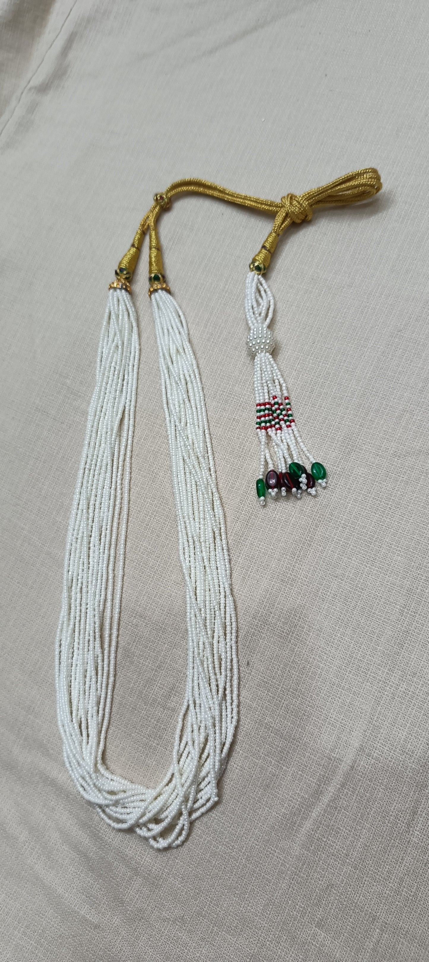 Graceful Multi-Strand White Bead Necklace with Colorful Tassel