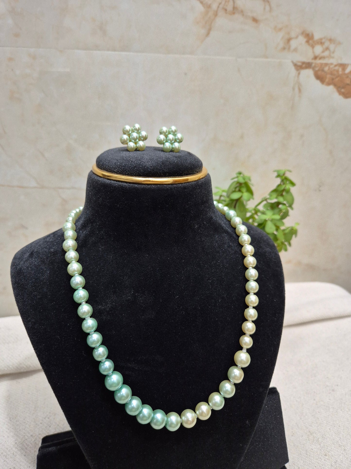 Metallic green and beige dual shade elegant pearl necklace set