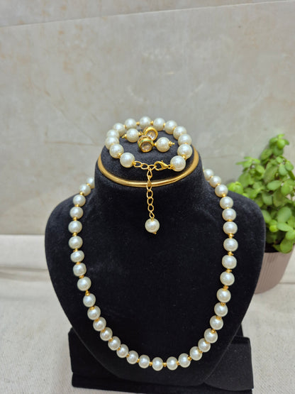 White pearl jewellery set with golden spacers - 5 piece set