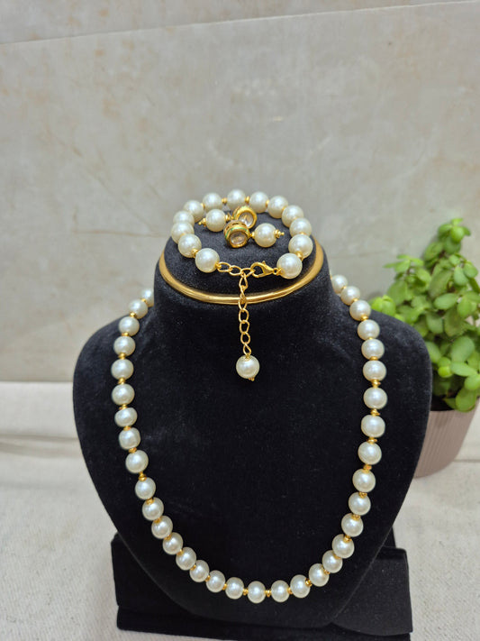 White pearl jewellery set with golden spacers - 5 piece set