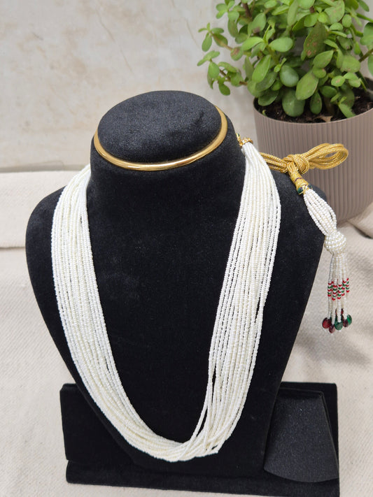 Graceful Multi-Strand White Bead Necklace with Colorful Tassel