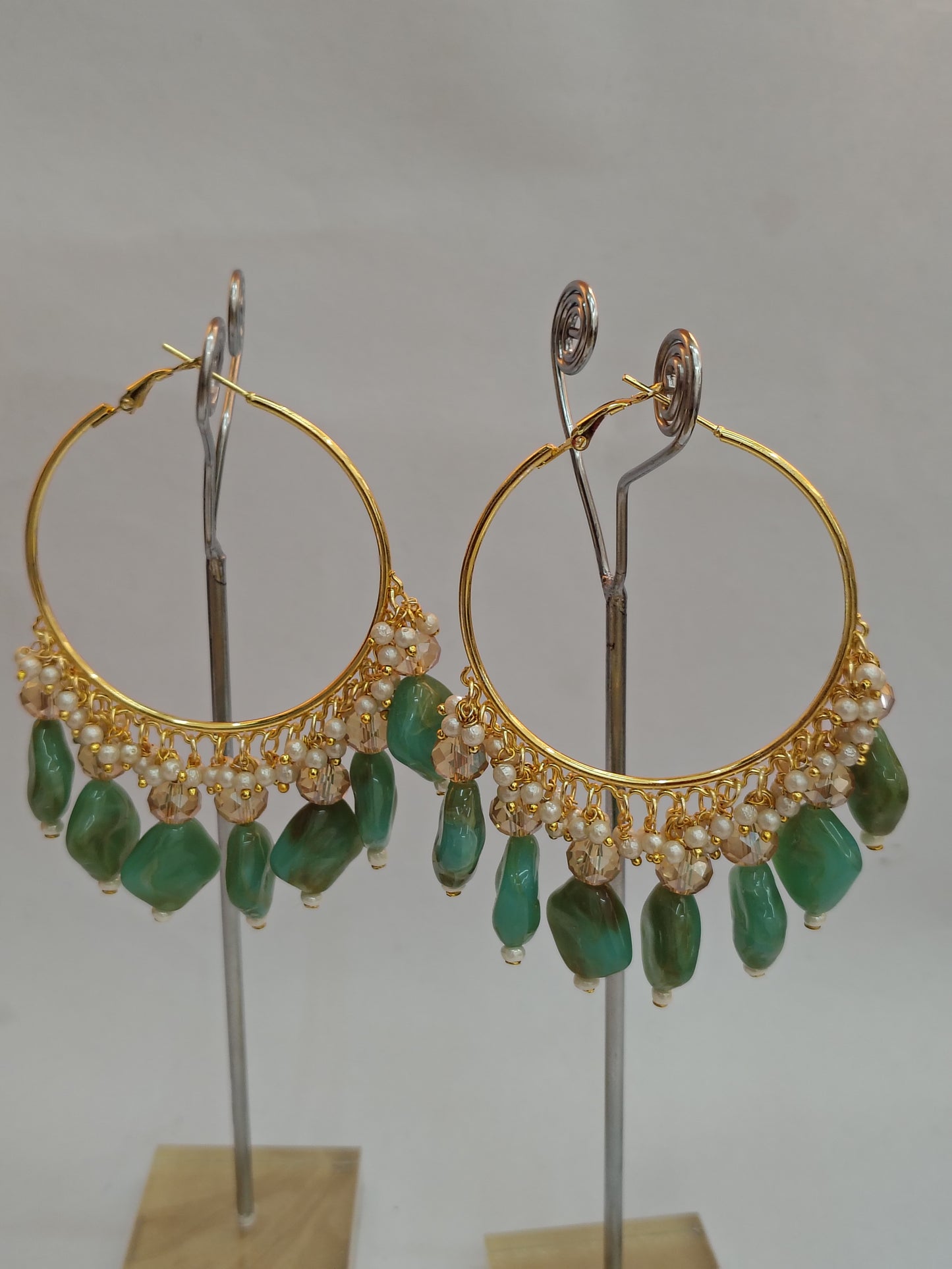 Golden Metal Hoop With C Green Stone