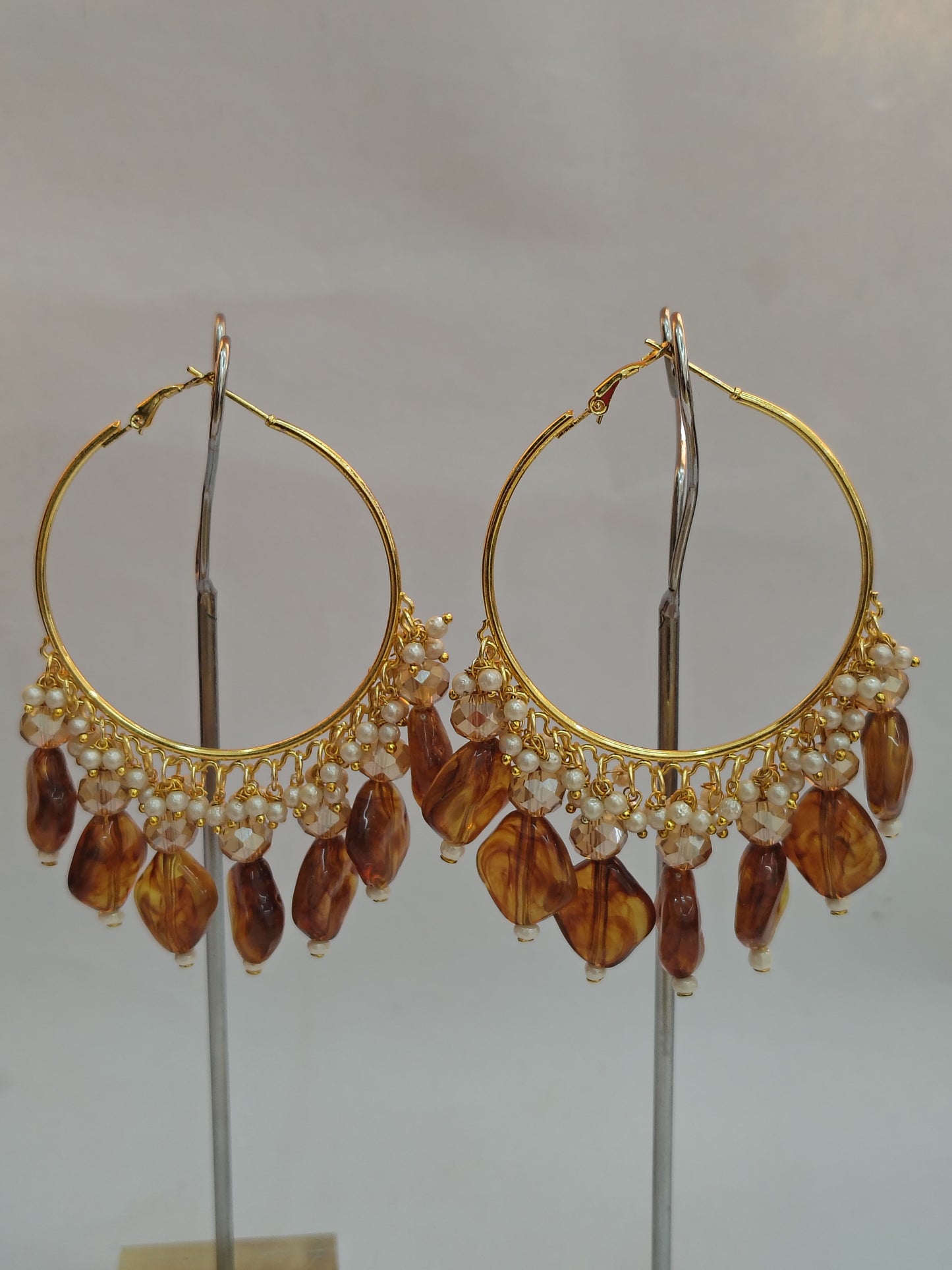 Golden Metal Hoop With Brown Shade Stone