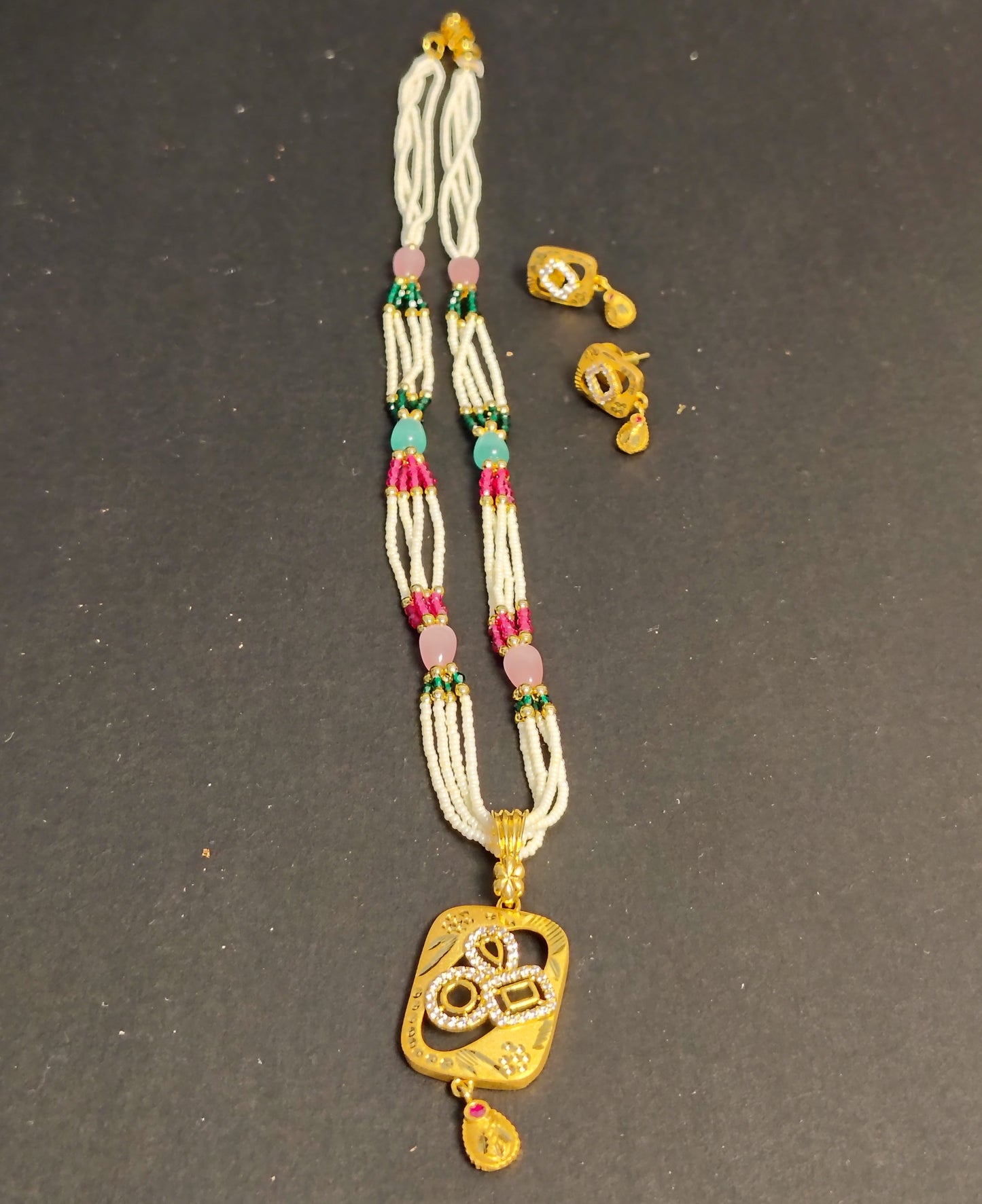 Golden pendent Set With Matching Earrings DB00060