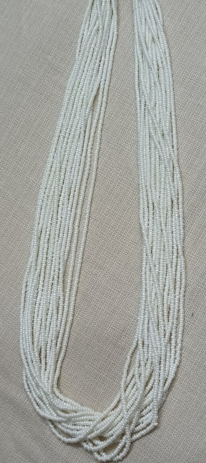 Graceful Multi-Strand White Bead Necklace with Colorful Tassel