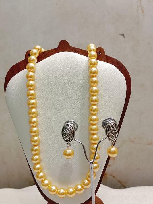 Bright Yellow Pearl Necklace With Oxidised Earrings